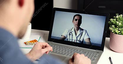 Online doctor consultation - man talking with physician on laptop at home during telemedicine video call