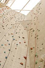 Rock climbing wall with ropes