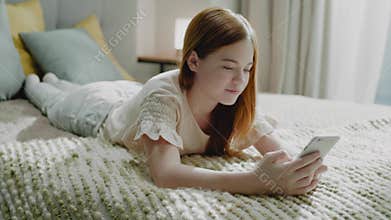 Pretty Girl Surf Internet on Smartphone