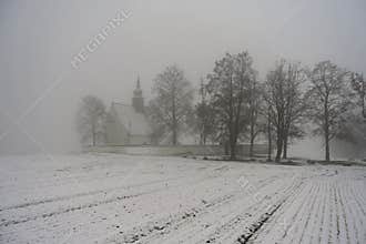 Winter landscape with a beautiful chapel near castle Veveri. Czech Republic city of Brno. The Chapel of the Mother of God