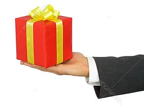 Businessman's Hand Holding Gift