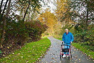 Senior Man with Walker in Park