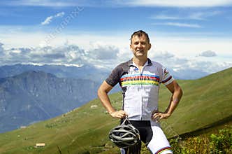 Mountain biker posing on top