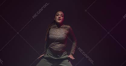 Ethnic african female modern dance. Cool dancing young girl performing in studio. Rhythm and passion concept