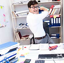 Busy frustrated businessman angry in the office