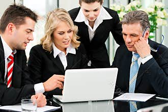 Business - team meeting in an office