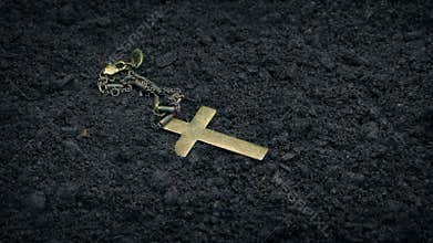 Cross Necklace Drops Onto The Ground
