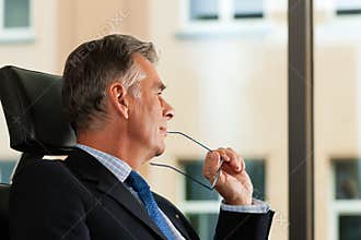Business - Boss contemplating in his office