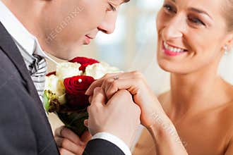 Wedding couple giving promise of marriage