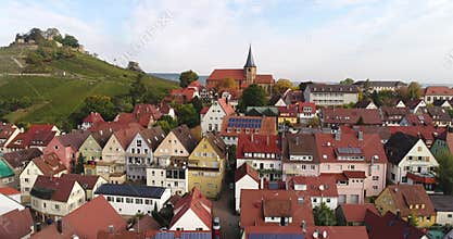 Flying copter over the beautiful rural town Weinsberg near the Burgruine Weibertreu in Heilbronn, Germany. 4k footage.