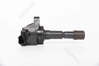 Old Ignition coil of Gasoline engine white background service concept and maintenance long time with car