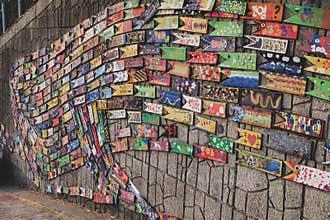 Wall art made of painted wooden fish in Busan Culture Village in Busan, Korea