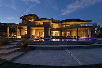 Modern Building With Swimming Pool At Dusk