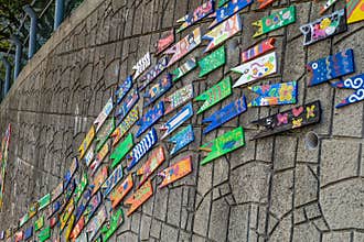 Wall art made of painted wooden fish in Busan Culture Village in Busan, Korea