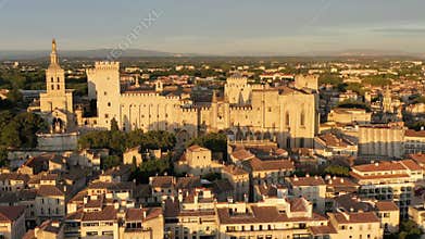 View of Avignon with Palais des Papes during sunset in Southern France. Medieval architecture along the Rhone River in Avignon,