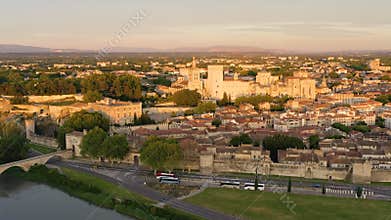 View of Avignon with Palais des Papes during sunset in Southern France. Medieval architecture along the Rhone River in Avignon,