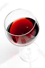 Top of view of red wine glass under daily light