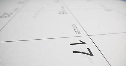 Closeup of calendar page showing 18th 17th 16th day of month