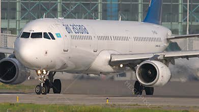 Airbus A321 of Air Astana turning on the runway