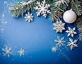 Snow Ornaments and Fir Twigs on a Blue Background for Elegant Christmas Decorations