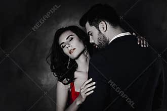 Portrait of seductive brunette lady with close eyes enjoying gentle touch of gentlemen with stubble, lovely mr and mrs