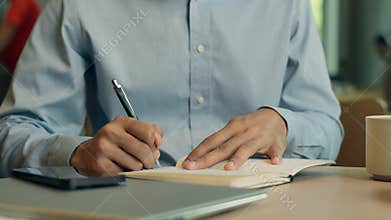 Unrecognizable man businessman writer teacher freelance worker client visitor student write notes business tasks on