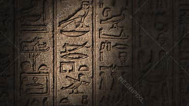 Light spot moving on egypt hieroglyphics