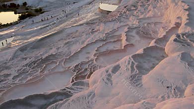 Aerial view of the travertines in Pamukkale, Turkey. White limestone mineral formations.