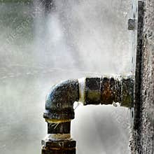 Old Leaky Pipes Squirting Water Leak Spray