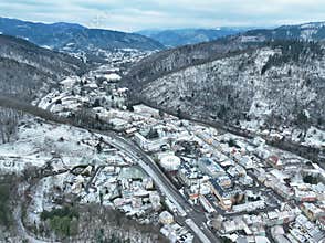 Aerial view of snow in mountain area Thann of Haut-Rhin, in Grand Est, Alsace, France.
