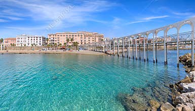 Cityscape of Civitavecchia in Italy: view of Pirgo beach with its pedestrian bridge.