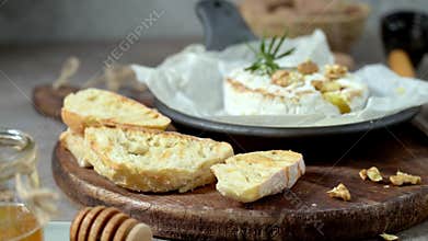 Fresh sliced Camembert cheese