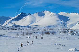 Winter backcountry ski skitour expedition in the mountains of Sweden beyond northern polar circle