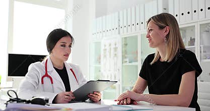 Patient explains health problems and symptoms to doctor