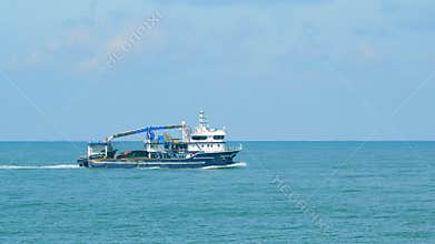 Fishing Vessel Sailing On Waves In Sea To Fish. Sea Summer Ocean Daylight Nature Background. Still.