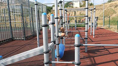 Children on the playground on the street in the yard. Live a healthy life. Be H3althy