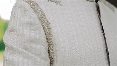 Inside the Indian wedding, the bridegroom brides together and worships the Lord. Happy indian groom handsome portrait