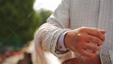 Inside the Indian wedding, the bridegroom brides together and worships the Lord. Happy indian groom handsome portrait