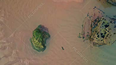 Sunset illuminating dunes drone perspective. Terrain intricate patterns weave