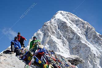 Climbers sitting at the foot of Kala Patthar mountain ,Nepal