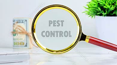 The conceptual text, the phrase PEST CONTROL appears through a magnifying glass on a gray background. The concept of a