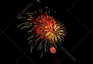 Fireworks Exploding Over the Mountains at night in Colorado