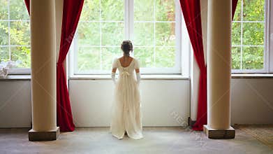 young woman is running in room looking out the window, waiting for love beloved man. Fantasy fairy lady Happy Princess