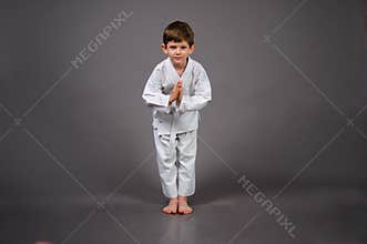Karate boy in white kimono