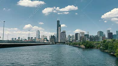 Chicago Skyline from the River, A stunning view of the Chicago skyline from the river, showcasing the city&#x27;s tall