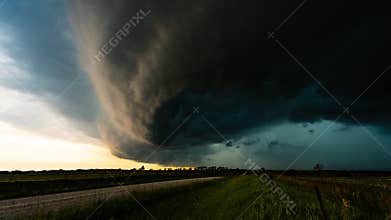 Dramatic storm quickly moves across fields and farm land bringing heavy wind and rain