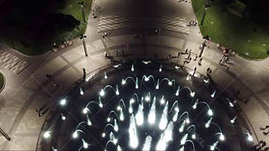 Look down aerial on fountain in night Kharkiv city