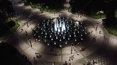 Speedup aerial on fountain in night illumination