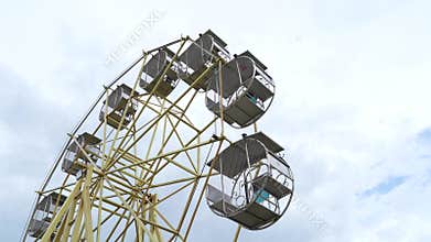 Ferris wheel on street festival night time.