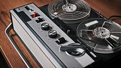 Vintage Reel-to-Reel Tape Recorder in Operation
